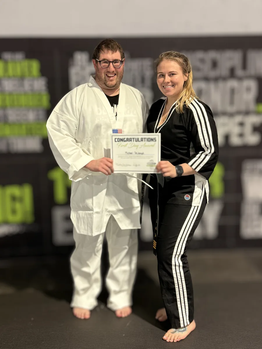 Kid receiving certificate at Rise Up NJ
